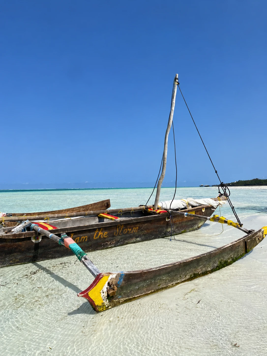 Traditional wooden boat on the shore in Zanzibar